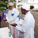 Clergy wash their hands before the service at the National Day of Prayer Coronavirus pandemic