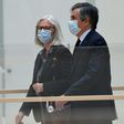 Former French prime minister Francois Fillon and his wife Penelope arriving at the Paris courthouse on Monday.