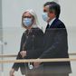 Former French prime minister Francois Fillon and his wife Penelope arriving at the Paris courthouse on Monday.