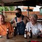 Patrons at the West Alabama Ice House in Houston have beers before Texas Governor Greg Abbott's order that all bars are to be closed amid a surge in coronavirus cases