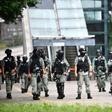 Riot police stand guard outside Hong Kong's legislature ahead of Wednesday's debate