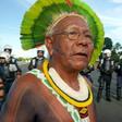 Indigenous chief Paulinho Paiakan, shown here standing in front of riot police in Brasilia, Brazil, on April 27, 2017 has died after contracting the new coronavirus, activists say