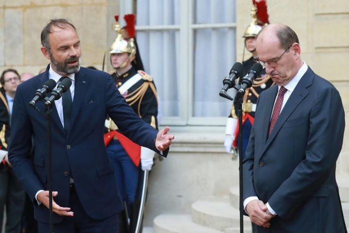 As Edouard Philippe (left) handed the prime ministerial mantle to Jean Castex (right) in Paris some analysts saw President Macron as tightening his own power grip