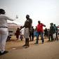 People at the border between Abuja and Nasarawa state waited to have their temperature checked