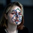 Activists in Moscow protesting the use of facial recognition technology paint geometrical shapes and lines on their faces as this is said to confuse the system