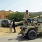 Fighters for Libya's UN-recognised Government of National Accord (GNA) gather at a position near the town of Garabulli, some 70km east of the capital Tripoli, amid battles with forces loyal to the Libyan strongman Khalifa Haftar earlier this month