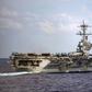 The USS Theodore Roosevelt aircraft carrier is in dock in Guam after an outbreak of Covid-19 infected at least 114 crew members