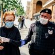 A protester is arrested in Moscow on Thursday