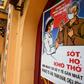 A stylised propaganda poster against  coronavirus in the old quarter of Hanoi
