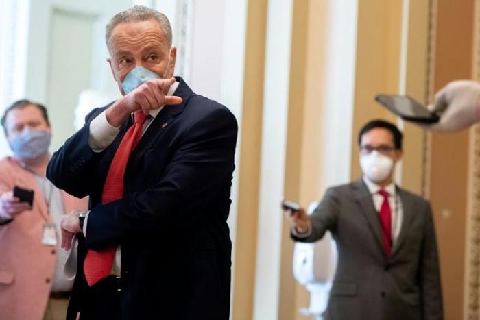 Democrats, like US Senate Minority Leader Chuck Schumer, are more likely to wear masks