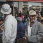 An elderly man from Soweto queues to collect his social grant