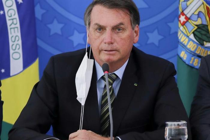 Brazil's President Jair Bolsonaro has faced nightly protests for weeks over his handling of the coronavirus crisis; he is pictured March 18, 2020