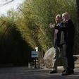Chinese Ambassador Cui Tiankai (left) speaks to the director of the National Zoo, Dennis Kelly, as they wait for the departure of giant panda Bao Bao in February 2017