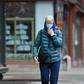A New Yorker wears a face mask on the street