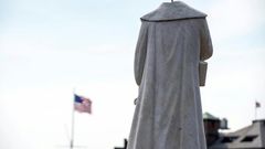 A decapitated statue of Christopher Columbus in Boston, Massachusetts