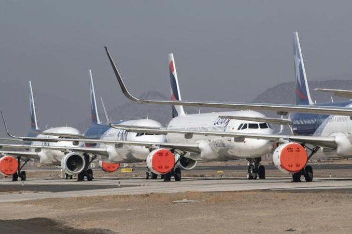 LATAM Airlines says it will cut 1,400 jobs from operations in Chile, Colombia, Ecuador and Peru