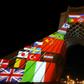 Tehran's Azadi (Freedom) Tower is lit up with national flags in solidarity with countries affected by the COVID-19 pandemic