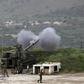 Israeli soldiers take part in a mobile artillery exercise near the border with Syria in the Israeli-occupied Golan Heights on April 5, 2020