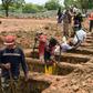 Workers dig graves at the Caminos del Cielo cemetery in Managua on May 23, 2020