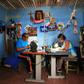 Jose Isaias Huerta (L), a former wrestler, and his wife, Virginia, manufacture lucha libre masks which people are using as face masks in the fight against coronavirus