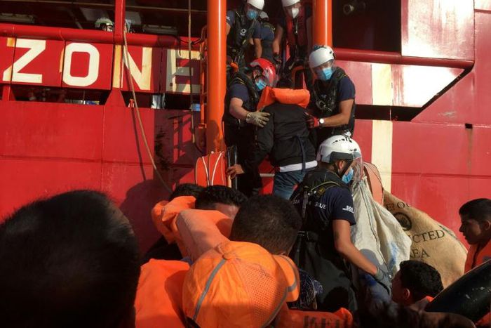 Migrants are rescued by members of French NGO SOS Mediterranee off the coast of Lampedusa on June 25, 2020