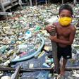 A boy wears a face mask in the Brazilian city of Manaus on May 26, 2020. Brazil has become a new global epicenter of the coronavirus pandemic in recent days
