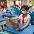 Students are wearing wings to maintain social distancing in Taiyuan in China's northern Shanxi province