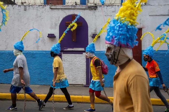 A group of men taking part in the "Judea of Masatepe" procession, a tradition in the Nicaraguan city near the capital Managua