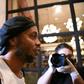 Brazilian former soccer star Ronaldinho arrives at a hotel in downtown Asuncion on April 7 to begin his house arrest after his release from jail