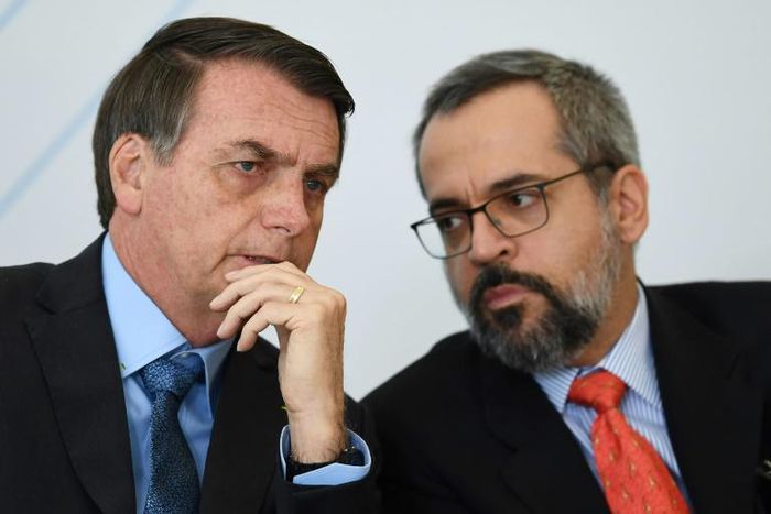 Brazilian Education Minister Abraham Weintraub (right, with President Jair Bolsonaro) is one of the government's most controversial ministers