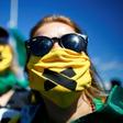 Supporters of Brazilian President Jair Bolsonaro protest on June 14, 2020 outside army headquarters against a decision by Brasilia's Governor Ibaneis Rocha preventing crowds from attending rallies