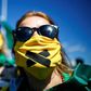 Supporters of Brazilian President Jair Bolsonaro protest on June 14, 2020 outside army headquarters against a decision by Brasilia's Governor Ibaneis Rocha preventing crowds from attending rallies