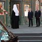 Russian President Vladimir Putin pays homage to Russia's World War II dead at an enormous new cathedral outside Moscow