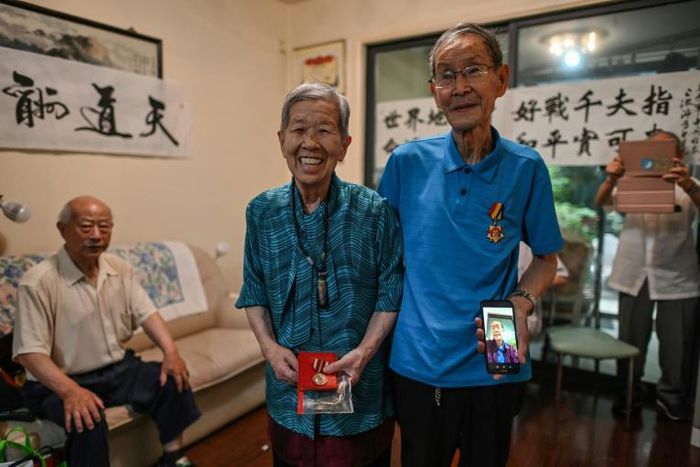 China and the US are deeply at odds again today over a range of trade and geopolitical issues, and no one is more sensitive to that than Yu Jihua (R), who still suffers night terrors from the war