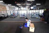 Inspire South Bay Fitness owner Peet Sapsin hosts a group class.