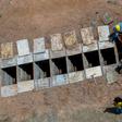 An aerial view of a burial is seen at the Bom Jardim cemetery, the largest public cemetery in Fortaleza, Ceara state, Brazil on May 7, 2020, as many of the burials were of people who were confirmed or suspected to have died from COVID-19