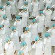 Nurses recite an oath on International Nurses Day at Tongji Hospital in Wuhan, China, where authorities have ordered the entire population be tested for the coronavirus