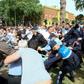 Dozens of opposition supporters, activists and actors battled with police as they tried to break through a security cordon