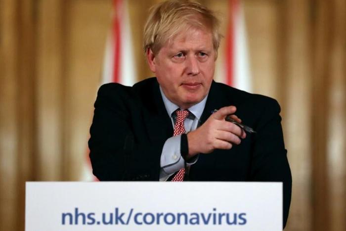 Britain's Prime Minister Boris Johnson announced new measures to halt the coronavirus outbreak 