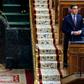 Spanish Prime Minister Pedro Sanchez speaks from his seat during a session to debate the extension of a national lockdown to curb the spread of the novel coronavirus at the Lower Chamber of the Spanish parliament in Madrid