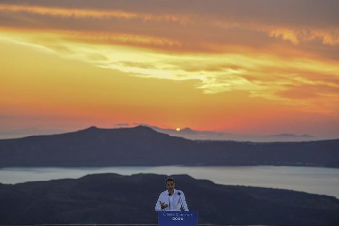 Greek Prime Minister Kyriakos Mitsotakis used the island of Santorini to announce that Greece is 'ready' to welcome tourists