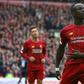 Liverpool's Senegalese striker Sadio Mane (R) has donated $50000 US dollars to the Coronavirus fight in gis country