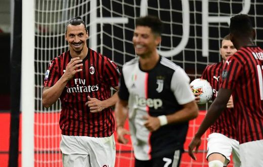 Zlatan Ibrahimovic shared a joke with Cristiano Ronaldo after scoring a penalty that helped AC Milan to a 4-2 win over Serie A leaders Juventus