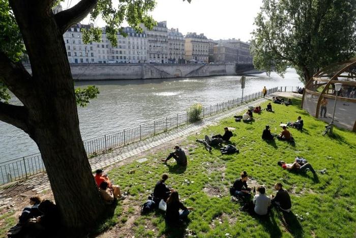 The French government has banned alcohol consumption alongside the Seine and the city's canals in a bid to dissuade merrymakers