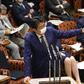 Abe told parliament: 'We must hold the Olympics as a testament to humanity's victory over the coronavirus.'