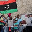 Residents of Tripoli celebrate after Libya's UN-recognised unity government announces it is back in full control of the capital and its suburbs