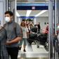 Travelers arrive at the international terminal of O'Hare Airport in Chicago on March 15, 2020
