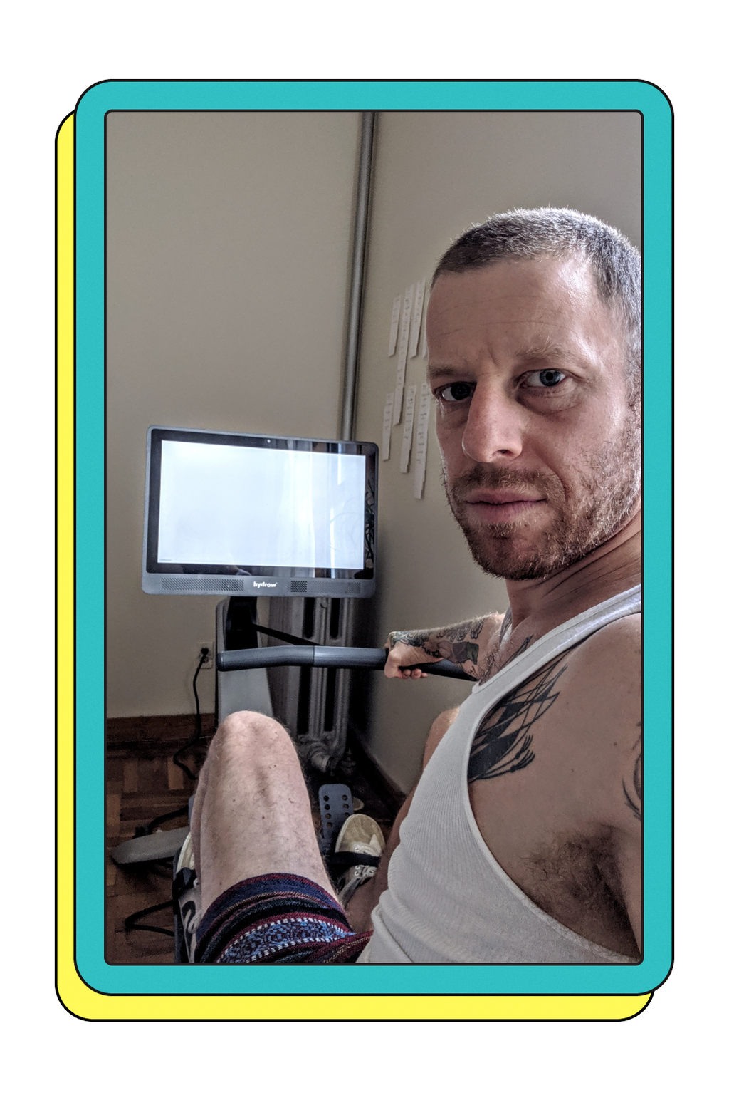 The author captaining his Hydrow rowing machine.