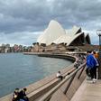 Some passengers on the Ruby Princess cruise ship were displaying flu-like symptoms when it berthed in Sydney Harbour