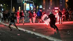 Some demonstrators also threw firecrackers and chanted nationalist slogans, according to AFP journalists